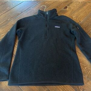 Women’s size small Patagonia half zip black fleece.